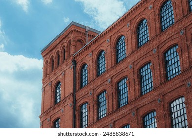 Historical industrial red brick factory building. Manufaktura - shopping and entertainment center. Lodz, Poland. - Powered by Shutterstock