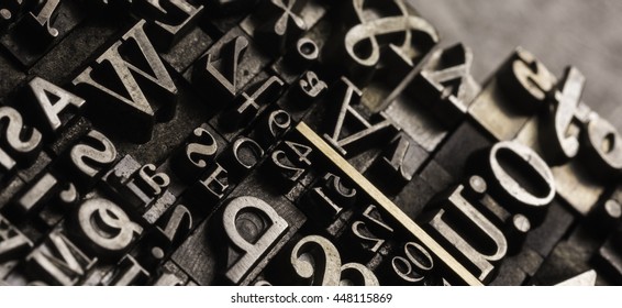 Historical letterpress types, also called as lead letters. These kind of letters were used in Gutenberg presses. These letters were the beginning of typography. And were used in typesetting - Shutterstock ID 448115869