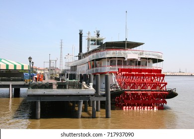 historical Mississippi steamer anchored at river quay