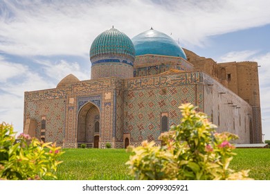 Historical monument. Turkestan. Mausoleum of Yassavi. Green grass and flowers close-up. Green lawn. The facade of the old palace. UNESCO World Heritage Site. Sufism. Muslim monument. Islam - Shutterstock ID 2099305921
