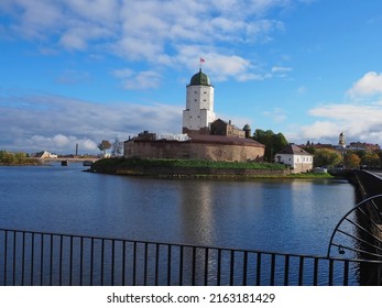 Historical monument. View of the Vyborg Castle, the embankment and the tower of St. Olaf. Russia, Leningrad region.
