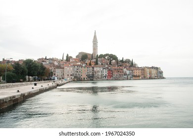 Historical Northern Croatian Fishing Town Rovinj and its Church of Saint Euphemia seen from the Port in Winter