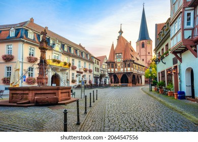 Historical Old town of Michelstadt in Odenwald, Germany, view of the colorful houses and timber-frame Town Hall on the central square on sunrise - Shutterstock ID 2064547556