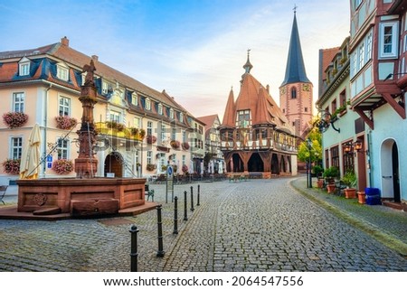 Historical Old town of Michelstadt in Odenwald, Germany, view of the colorful houses and timber-frame Town Hall on the central square on sunrise