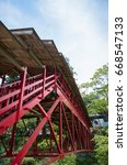 Historical red bridge at Hokoji Zen temple.