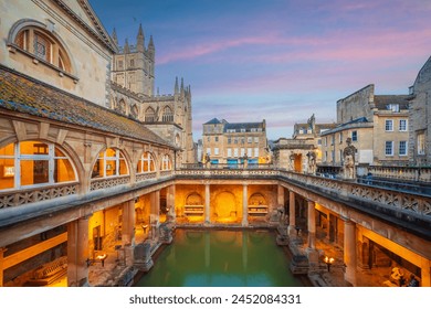 Historical roman bathes in Bath city, England at twilight