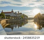 Historical stone fortress on embankment of river Danube in old town. Neuburg an der Donau, Germany - May 04, 2024