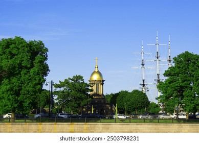 Historical temple with golden domes, Orthodox church, Catholic church against the blue sky. Historical building. - Powered by Shutterstock