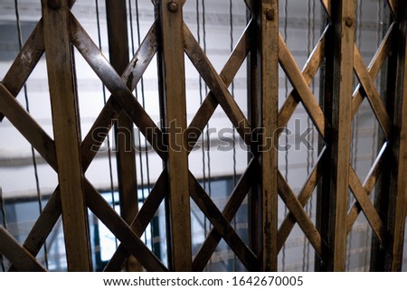 an historicbuilding old elevator safety door metal cage