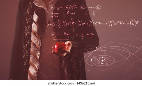 History of science, concept. Isaac Newton with Apple in hand. Gravity and the theory of gravity. Research in physics. - Shutterstock ID 1436213564