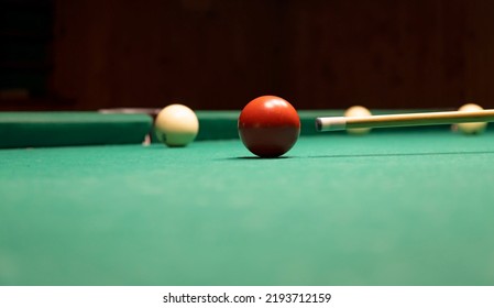 Hit The Cue Ball On The Red Ball. Resting With Friends, Playing Snooker.