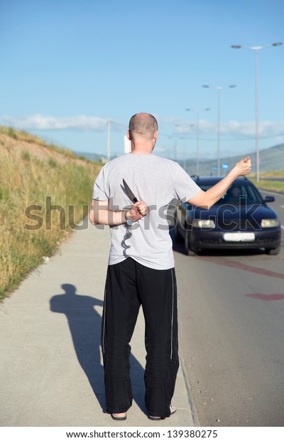 Hitchhiker Young Man Hitchhiking On Road Stock Photo (Edit Now) 139380275