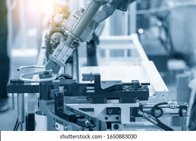 The hi-technology  material handing process by robotics system tube bending process. The hi-technology automotive parts manufacturing  process control by computer system. - Shutterstock ID 1650883030