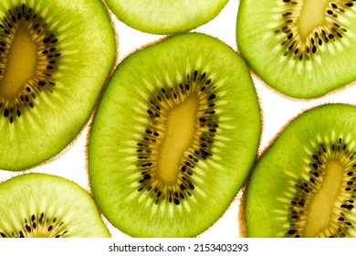 Hith angle of cut kiwis close up vibrant background