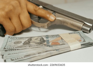 Hitman and banknote. Crime concept.