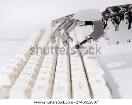 Robot's hand hits the keyboard.Ai concepts.