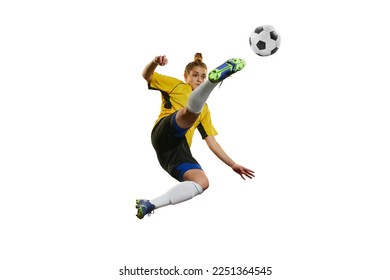 Hitting ball in a jump. Young professional female football, soccer player in motion, training, playing isolated over white background. Concept of sport, action, motion, goals, competition, hobby, ad. - Powered by Shutterstock