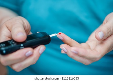 HIV Self Test Screening Performed By A Woman. Conceptual Close Up For Diabetes, Glycemia, Hematocrit, Hiv.