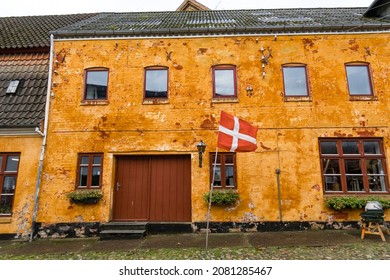 Hjorring, Denmark Nov 24, 2021 The Orange Facade Of A Classic Old Danish House.