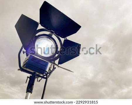 A HMI lamp in the cloudy sky for professional film lighting