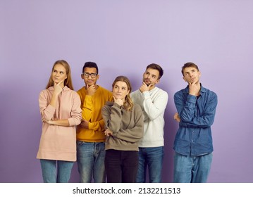 Hmm. Group of curious multiracial people with hands on chins and puzzled face expressions, look up, think hard, answer difficult question, doubt, reflect on serious problem, choose future career plans - Shutterstock ID 2132211513