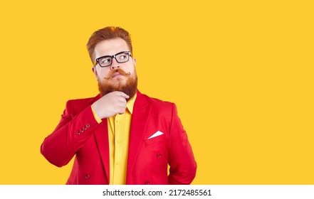 Hmm, interesting. Funny smart fat man thinking and looking sideways. Plus size guy in red suit and eyeglasses isolated on solid yellow background touches his beard and looks away at blank copy space - Shutterstock ID 2172485561
