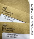 HMRC tax letters. Brown HMRC envelopes. An envelope from the UK tax office HM Revenue and Customs.