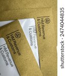 HMRC tax letters. Brown HMRC envelopes. An envelope from the UK tax office HM Revenue and Customs.