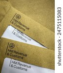 HMRC tax letters. Brown HMRC envelopes. An envelope from the UK tax office HM Revenue and Customs.