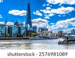 HMS Belfast Light Cruiser Ferry Quay Thames River London England. Belfast Launched 1938, part of D-Day fleet. Now a museum ship moored next to Tower Bridge and across from Tower Of London