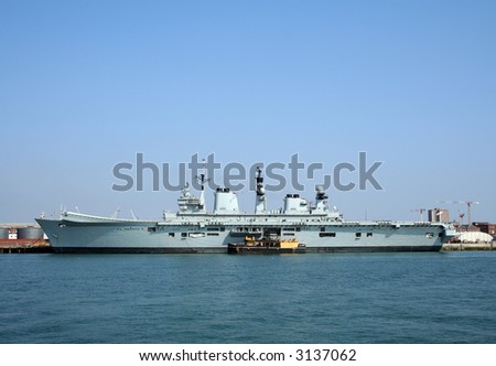 HMS Illustrious (R06), an Invincible class aircraft carrier in Portsmouth harbour