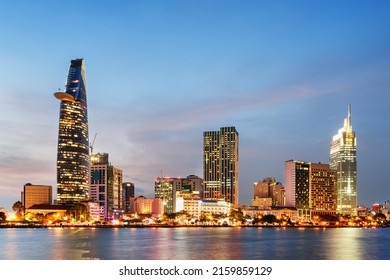 Ho Chi Minh City skyline and the Saigon River at sunset. Wonderful view of skyscraper and other modern buildings at downtown. Ho Chi Minh City is a popular tourist destination of Vietnam.
