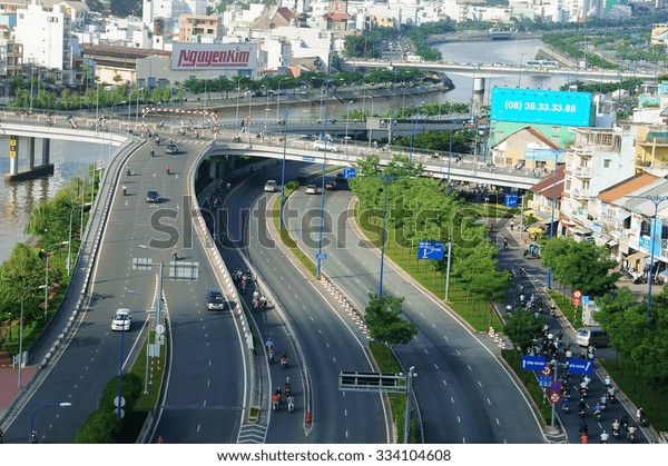 HO CHI MINH CITY, VIET NAM- AUG 11: Development of\
infrastructure with overpass road at intersection, number of\
vehicle as motorbike develop very strong, traffic overloaded,\
Vietnam, Aug 11, 2014