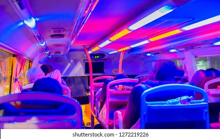 Ho Chi Minh City, Vietnam - December 2018. Interior Of Overnight Sleeper Bus Of Futa Bus Lines (Phuong Trang). Interior Illuminated With Colorful LED Lights. Long Distance Journey From Saigon To Hanoi