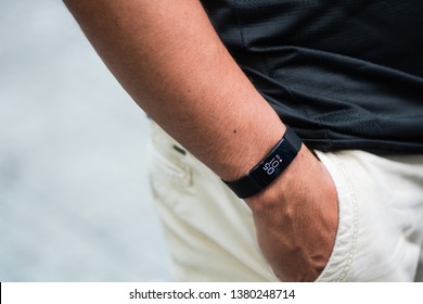 Ho Chi Minh city / Vietnam - Apr 25th 2019: Review Fitbit smartband, a friendly fitness trackers for every day
