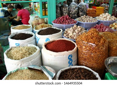 Ho Chi Minh City, Vietnam - Mart 28, 2019: Different kinds asian sugar on stall for sale on Binh Tay market in Saigon city. Real life in Asia.