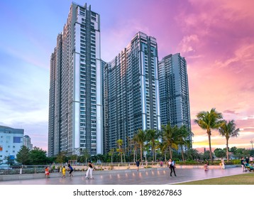 Ho Chi Minh City, Vietnam - January 17th, 2021: People Enjoy Entertainment At The Large Courtyard In The Afternoon In A Modern, International Apartment Complex In Ho Chi Minh City, Vietnam