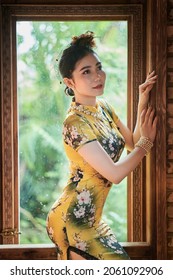 Ho Chi Minh City, Vietnam: Portrait of a beautiful Vietnamese girl in cheongsam 
