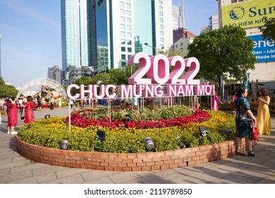 Ho Chi Minh City, Vietnam - February 04, 2022 : People were attending the Spring Flower Festival on Lunar New Year. Photo was taken on Nguyen Hue street, downtown Ho Chi Minh City.