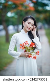 Ho Chi Minh City, Vietnam: a beautiful Vietnamese student in white ao dai