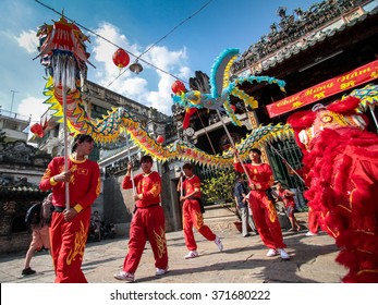 Ho Chi Minh City, Vietnam - Jan 22, 2012: The Show Of Lion And Dragon Dance At Vietnamese Lunar New Year Festival Tat. 