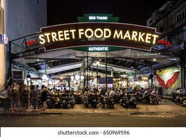 HO CHI MINH CITY, VIETNAM - APRIL 10, 2017: People have dinner in the covered Ben Thanh street food market in Ho Chi Minh City, Vietnam largest city formerly called Saigon.