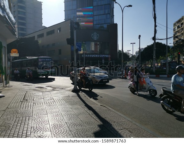 Ho Chi Minh City, Vietnam - December 15, 2019:\
Busy street view of lots of vehicles movement at ho chi minh city,\
the largest city in vietnam.