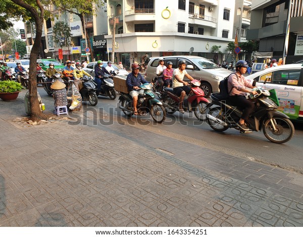 HO CHI MINH CITY,\
VIETNAM. January 17, 2019. Heavy traffic on the streets of Ho Chi\
Minh City (Saigon). Scooters and bikes are the most common vehicles\
used in Vietnam. 