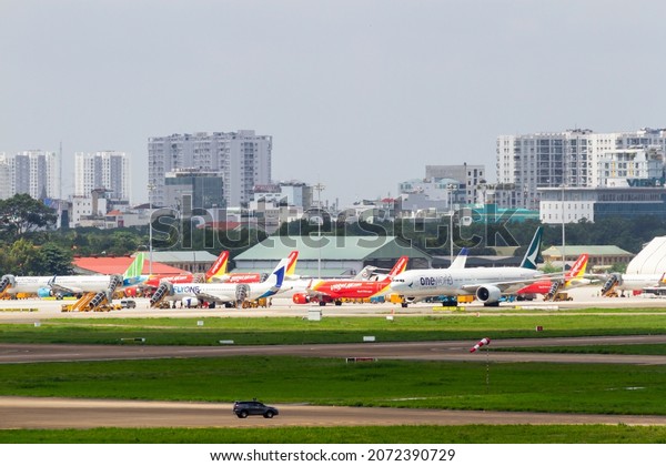 Ho Chi Minh City, Vietnam - ‎August 31, 2019\
: Security Car And Airplanes On The Ground At Tan Son Nhat\
International Airport\
(SGN-VVTS).