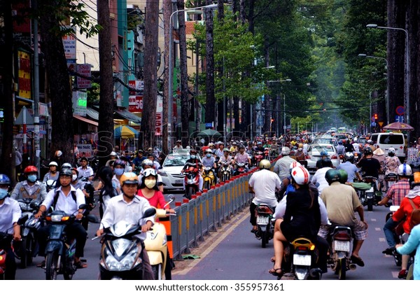 HO CHI MINH CITY, VIETNAM - SEPTEMBER 18, 2013:\
Road congested with motorists in Ho Chi Minh City (Saigon),\
Vietnam. There are approximately 340,000 cars and 3.5 million\
motorcycles in the city.