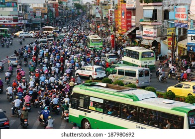 HO CHI MINH, VIET NAM- APRIL 18: Overview Of Urban Trafic At Asia City, Group Asian Citizen On Private Vehicles In Traffic Jam, Crowded, Overloaded, Mob Of People Move Slow, Vietnam, April 18, 2014