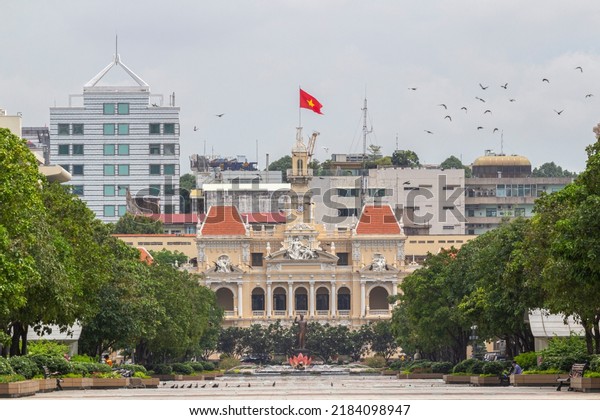 HO CHI\
MINH, VIETNAM - 21 JUN, 2021 - The historic Peoples\' Committee\
Building in Ho Chi Minh Square in the\
afternoon
