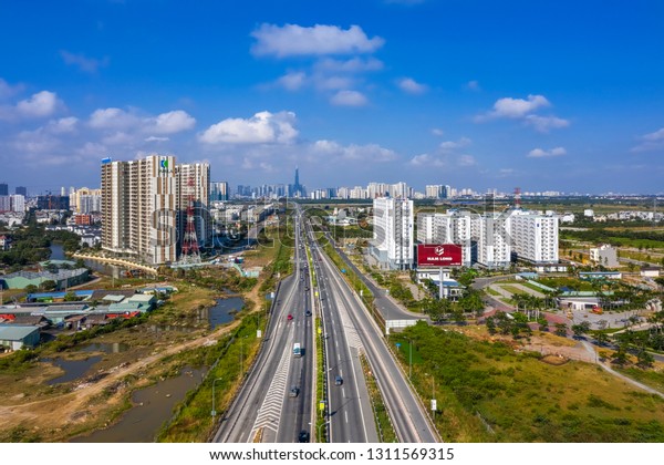 HO CHI MINH,\
VIETNAM - JAN 20, 2019: Top view aerial of Long Thanh - Dau Giay\
expressway towards Ho Chi Minh City, Vietnam. View from District 2,\
with developed transport\
system
