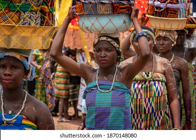 Ho, Ghana - September 15, 2018: Teenage Girls Carry Baskets Of Gifts For The Paramount Chief At A Festival In Rural Ghana, West Africa.